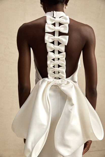 Capucine white oversize-bow bandage dress